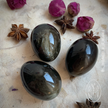 Cargar imagen en el visor de la galería, Huevo Yoni de Obsidiana Dorada Mediano, sin agujero.